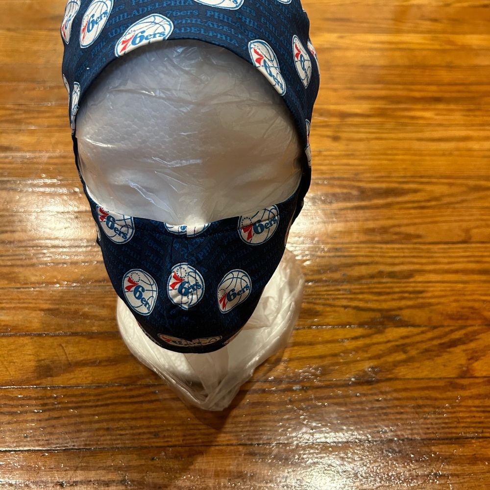 Surgical cap with matching mask.